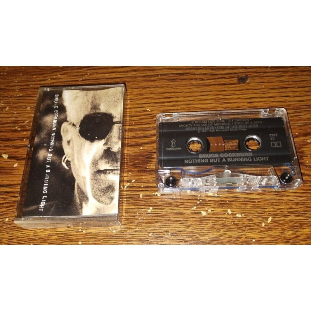 Bruce Cockburn - Nothing but a Burning Light on cassette (1991, Sony Music)